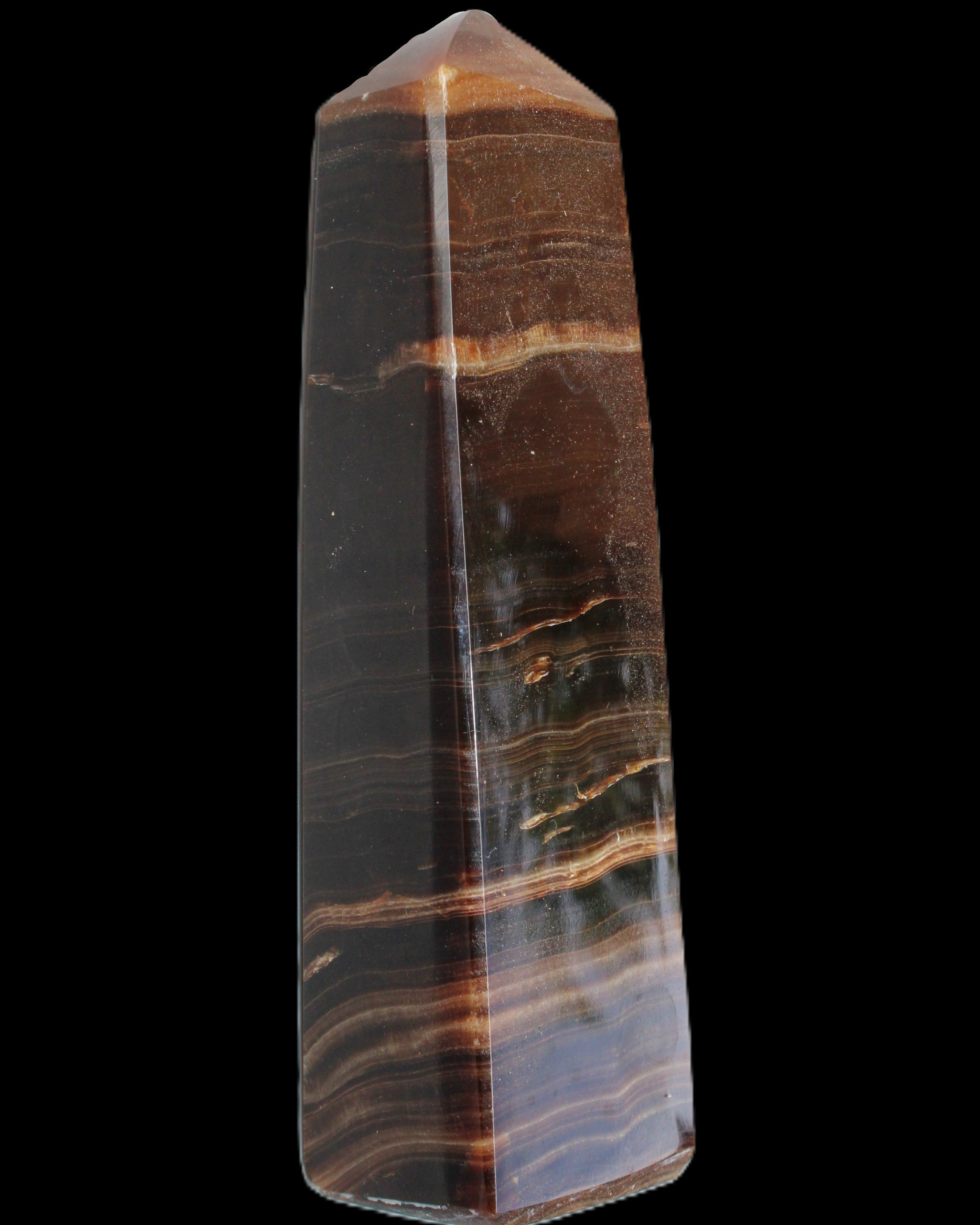 Chocolate Calcite obelisk 119*33 mm 222g in sunlight - Rocks and Things Store