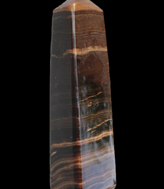 Chocolate Calcite obelisk 119*33 mm 222g in sunlight - Rocks and Things Store