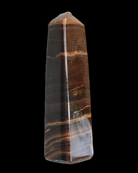 Chocolate Calcite obelisk 119*33 mm 222g in sunlight - Rocks and Things Store