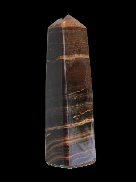 Chocolate Calcite obelisk 119*33 mm 222g in sunlight - Rocks and Things Store