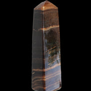 Chocolate Calcite obelisk 119*33 mm 222g in sunlight - Rocks and Things Store