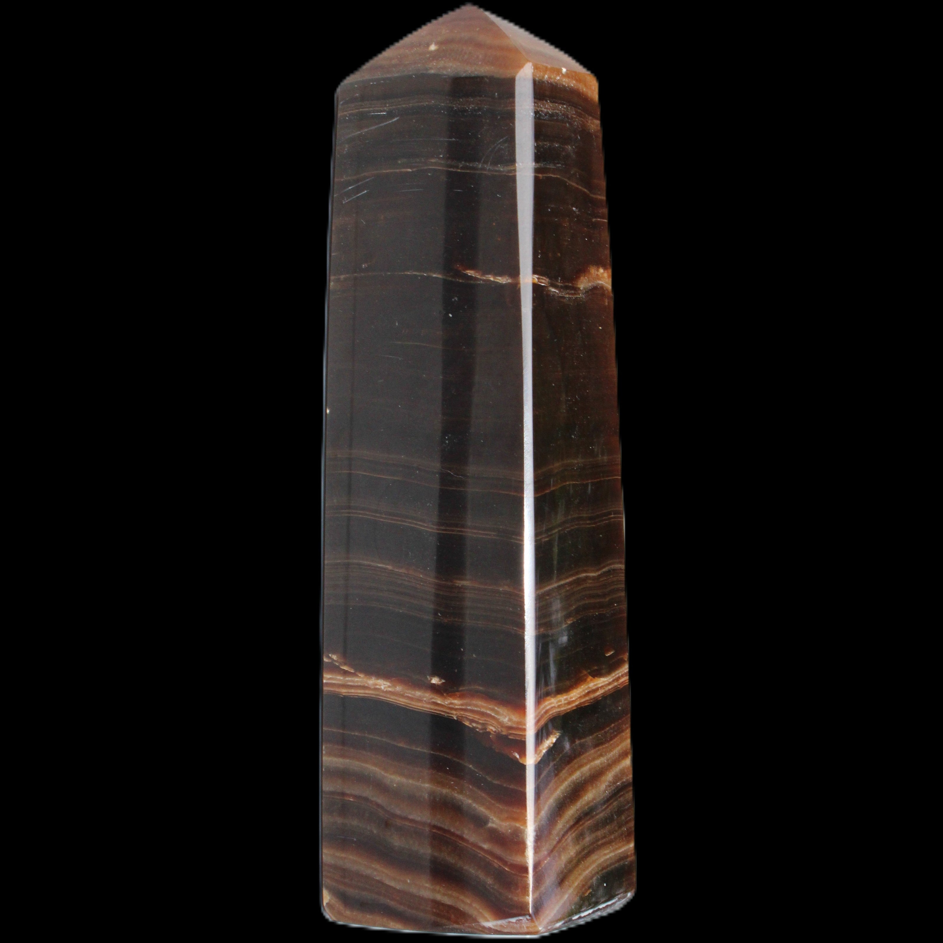 Chocolate Calcite obelisk 119*33 mm 222g in sunlight - Rocks and Things Store