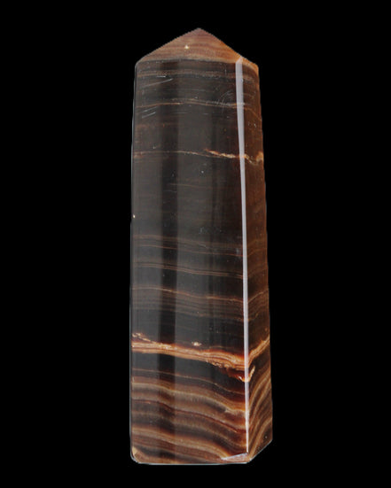 Chocolate Calcite obelisk 119*33 mm 222g in sunlight - Rocks and Things Store