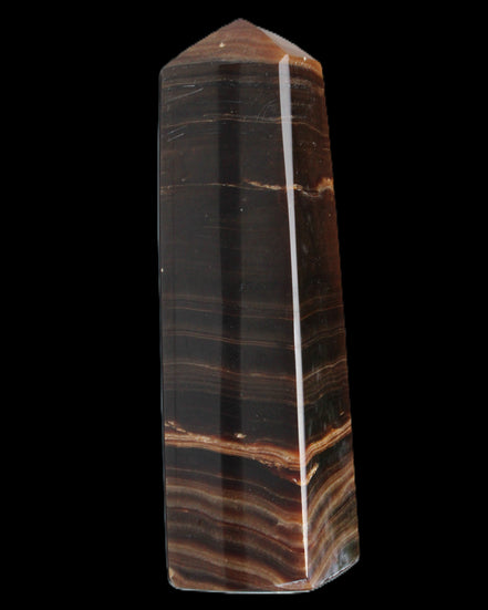 Chocolate Calcite obelisk 119*33 mm 222g in sunlight - Rocks and Things Store