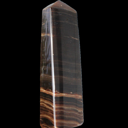 Chocolate Calcite obelisk 119*33 mm 222g in sunlight - Rocks and Things Store