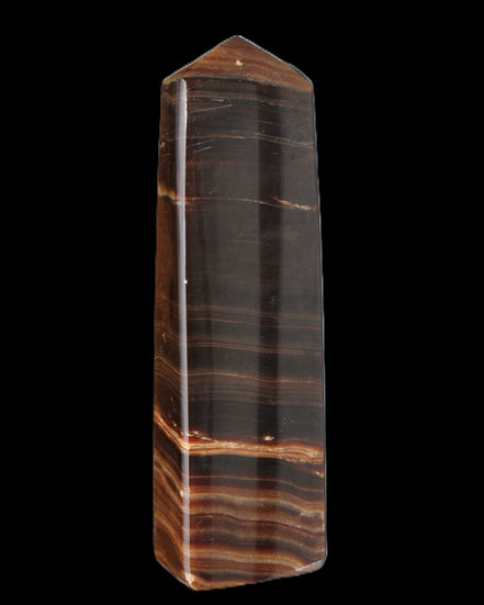 Chocolate Calcite obelisk 119*33 mm 222g in sunlight - Rocks and Things Store
