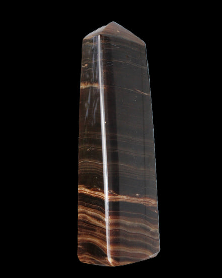 Chocolate Calcite obelisk 119*33 mm 222g in sunlight - Rocks and Things Store