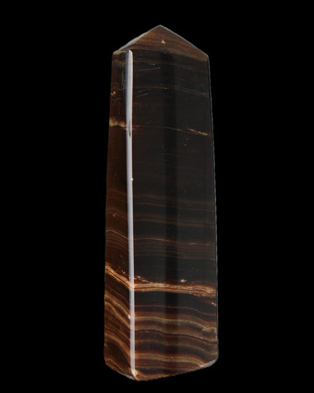 Chocolate Calcite obelisk 119*33 mm 222g in sunlight - Rocks and Things Store