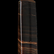 Chocolate Calcite obelisk 119*33 mm 222g in sunlight - Rocks and Things Store