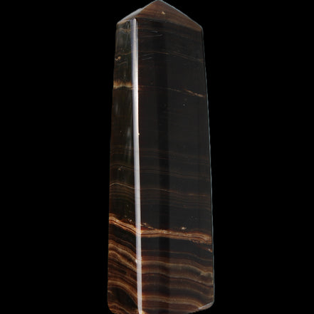 Chocolate Calcite obelisk 119*33 mm 222g in sunlight - Rocks and Things Store