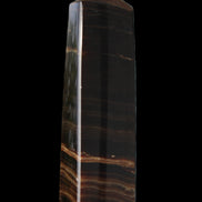Chocolate Calcite obelisk 119*33 mm 222g in sunlight - Rocks and Things Store