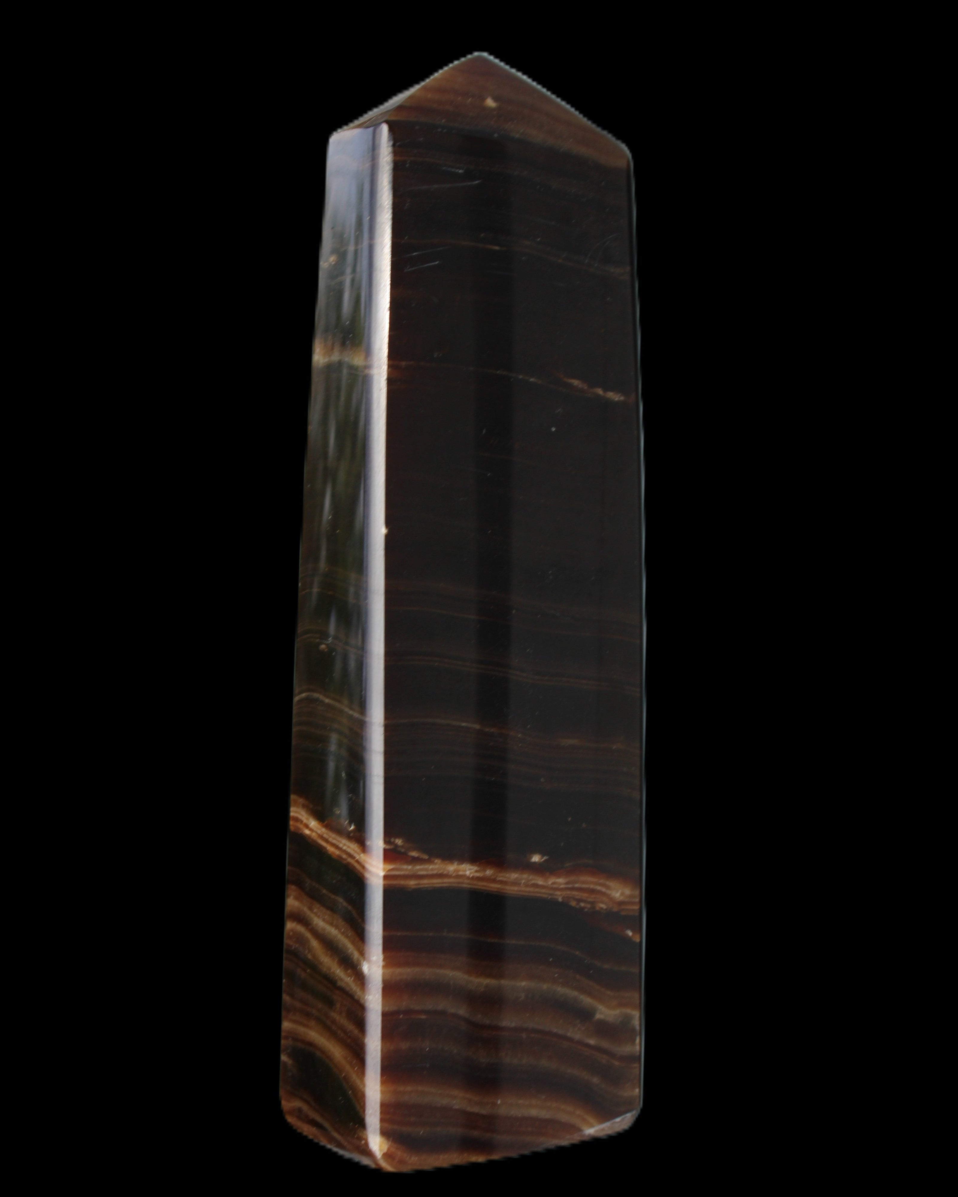 Chocolate Calcite obelisk 119*33 mm 222g in sunlight - Rocks and Things Store