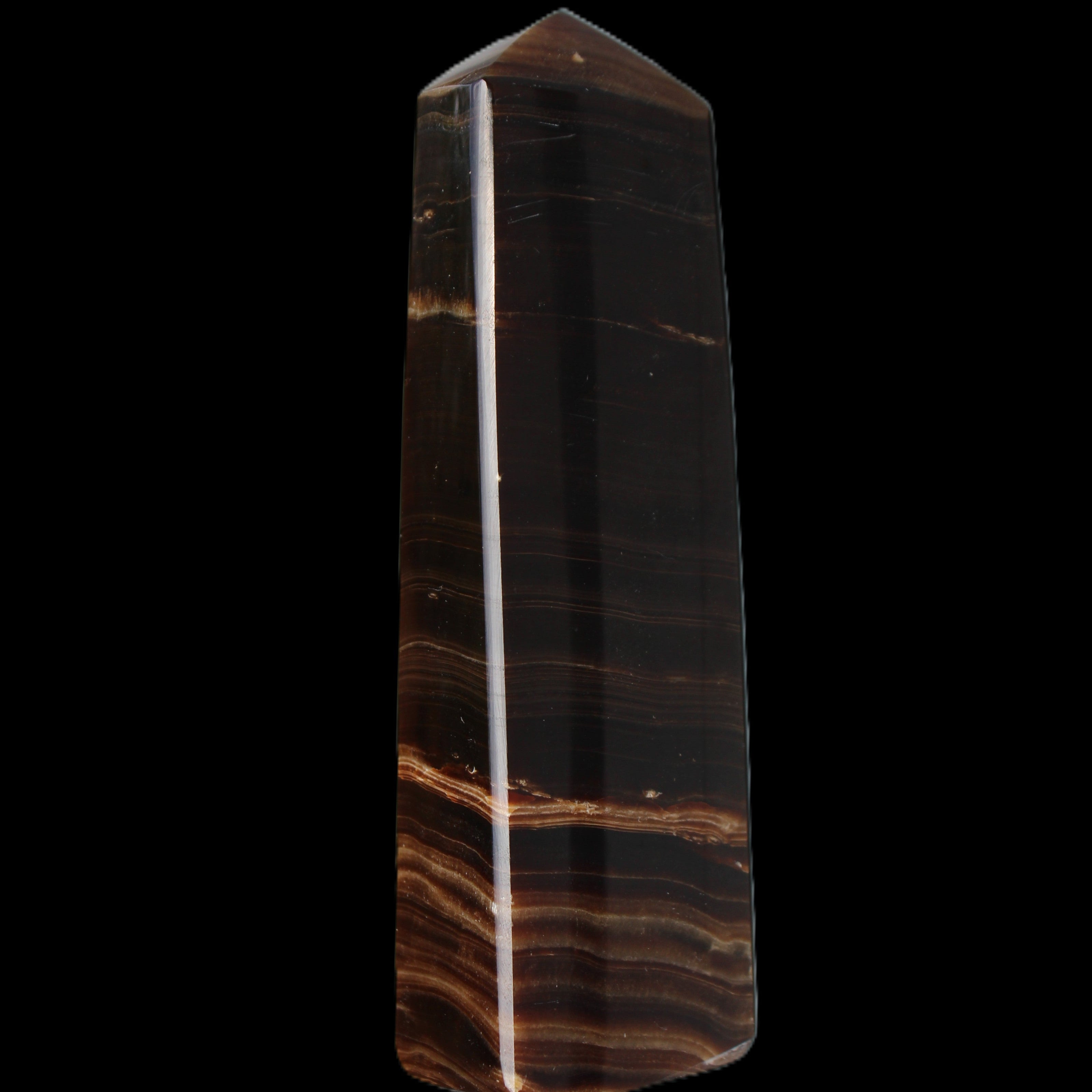 Chocolate Calcite obelisk 119*33 mm 222g in sunlight - Rocks and Things Store