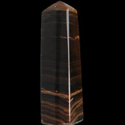 Chocolate Calcite obelisk 119*33 mm 222g in sunlight - Rocks and Things Store