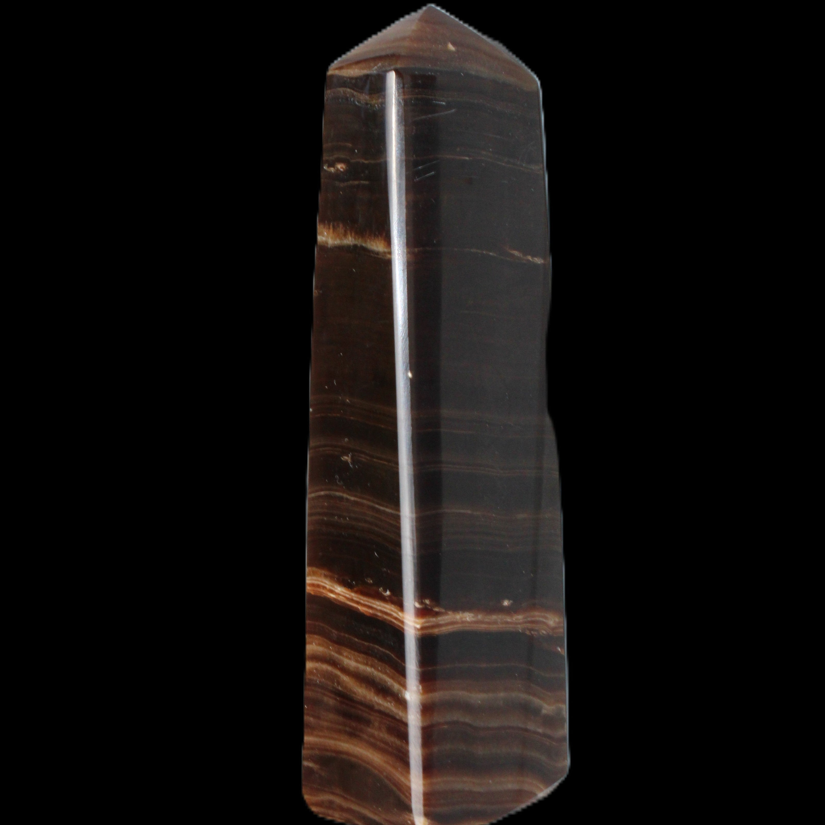 Chocolate Calcite obelisk 119*33 mm 222g in sunlight - Rocks and Things Store