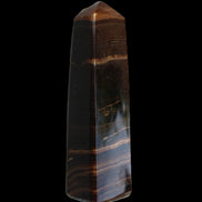Chocolate Calcite obelisk 119*33 mm 222g in sunlight - Rocks and Things Store