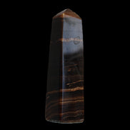 Chocolate Calcite obelisk 119*33 mm 222g in sunlight - Rocks and Things Store