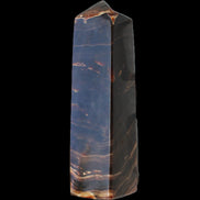 Chocolate Calcite obelisk 136*36mm 366g in sunlight - Rocks and Things Store