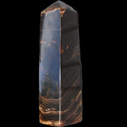 Chocolate Calcite obelisk 136*36mm 366g in sunlight - Rocks and Things Store