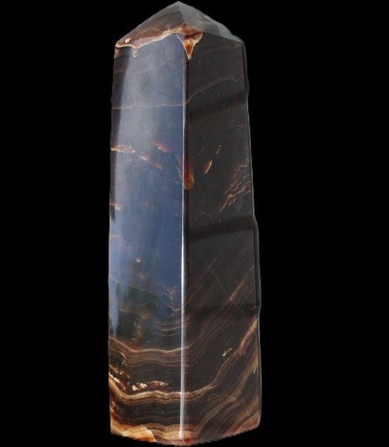 Chocolate Calcite obelisk 136*36mm 366g in sunlight - Rocks and Things Store