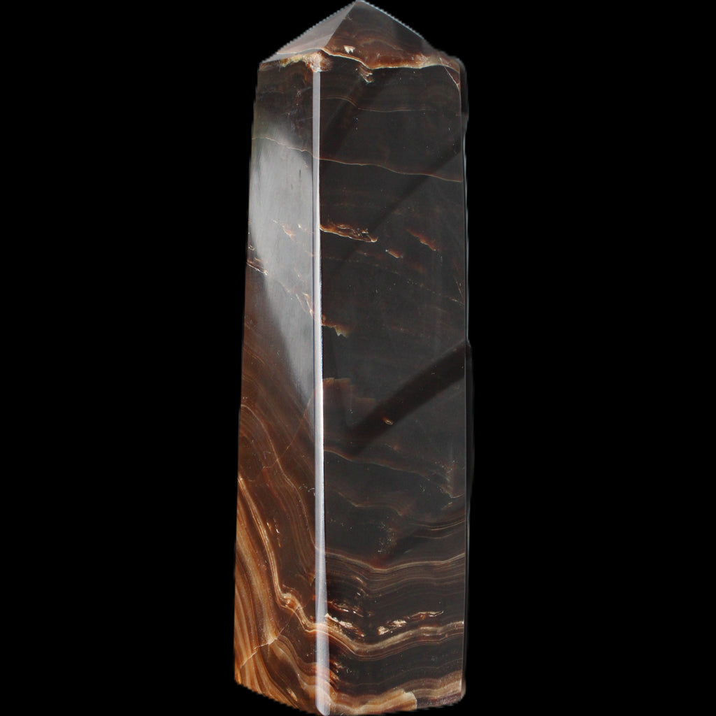 Chocolate Calcite obelisk 136*36mm 366g in sunlight - Rocks and Things Store
