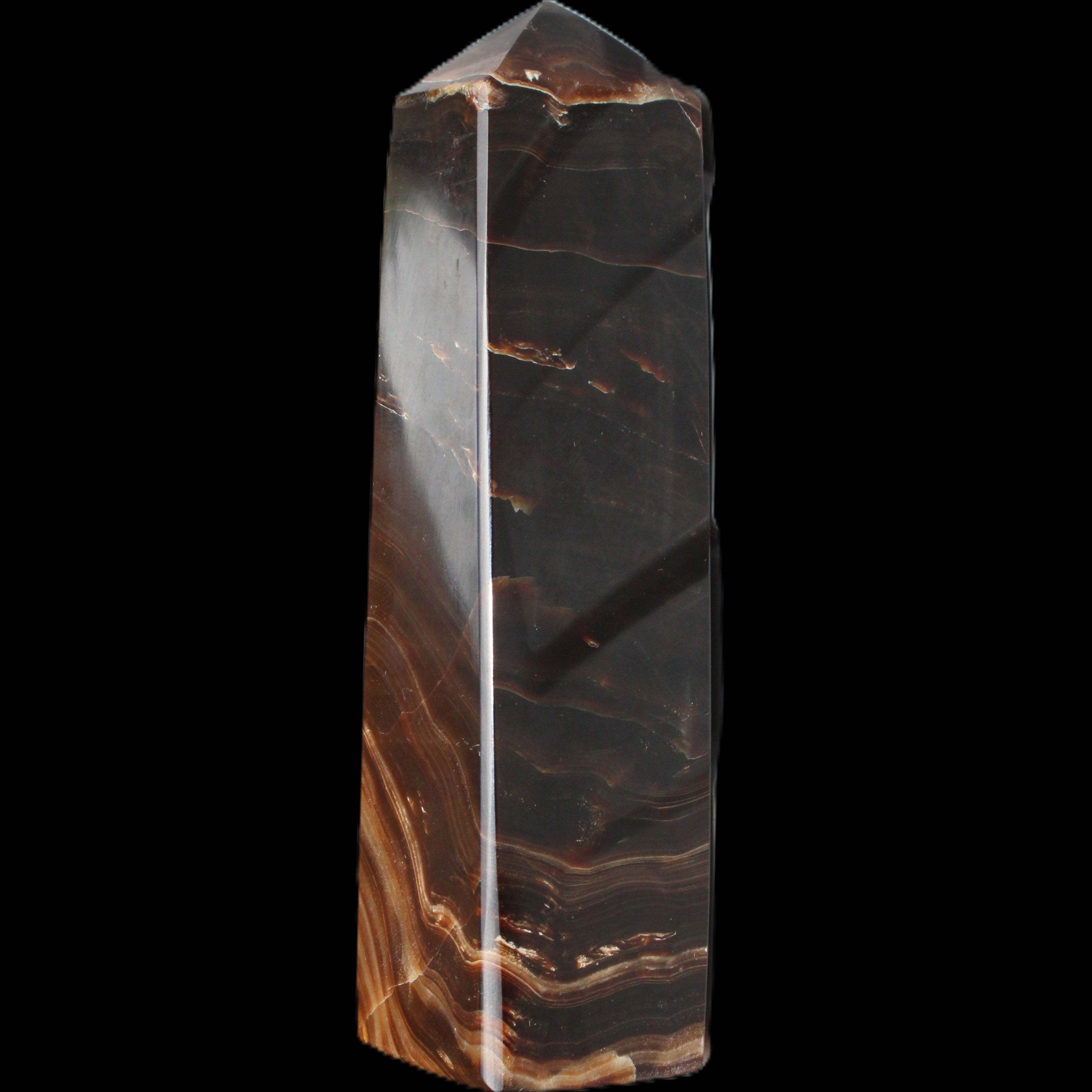 Chocolate Calcite obelisk 136*36mm 366g in sunlight - Rocks and Things Store