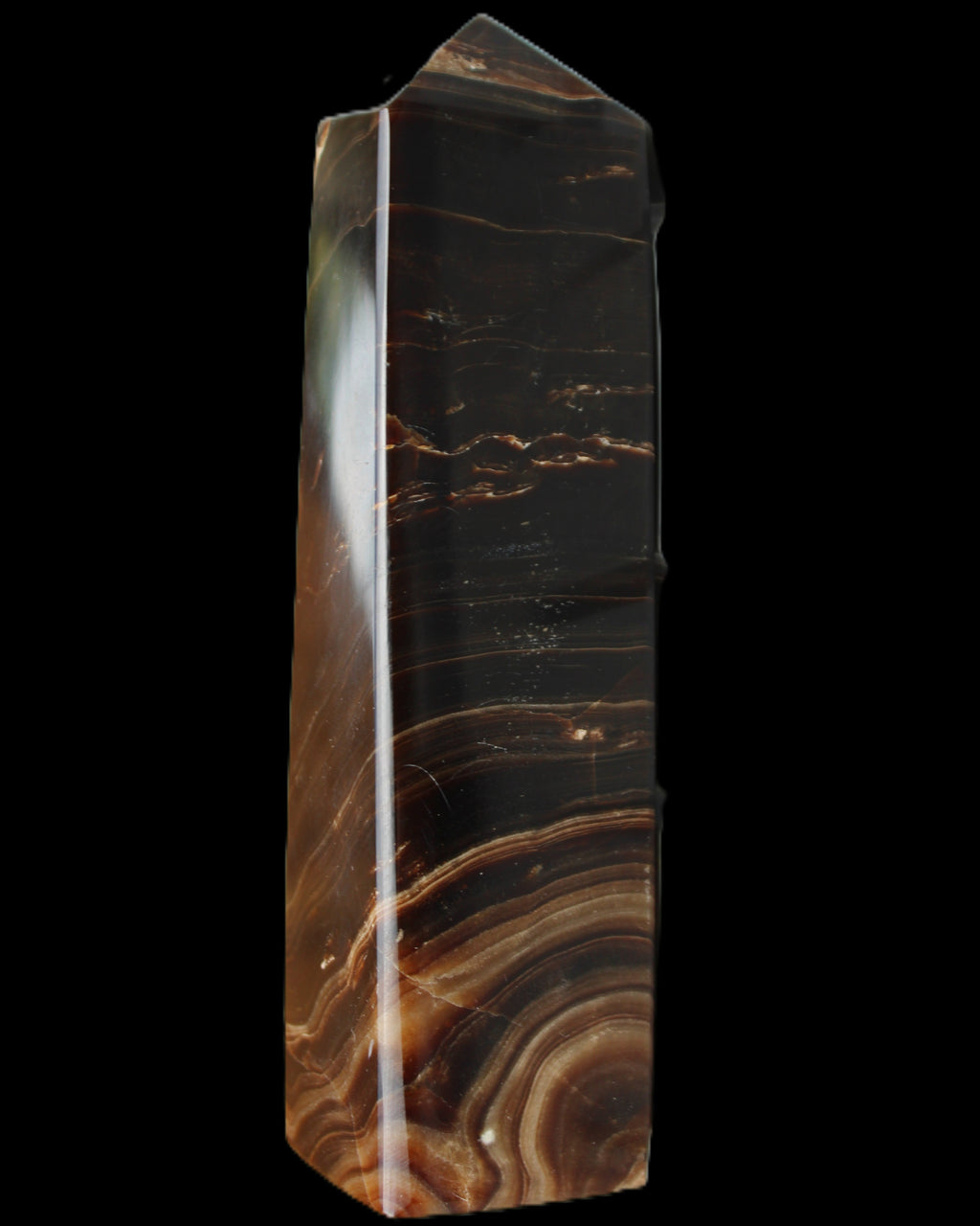 Chocolate Calcite obelisk 136*36mm 366g in sunlight - Rocks and Things Store