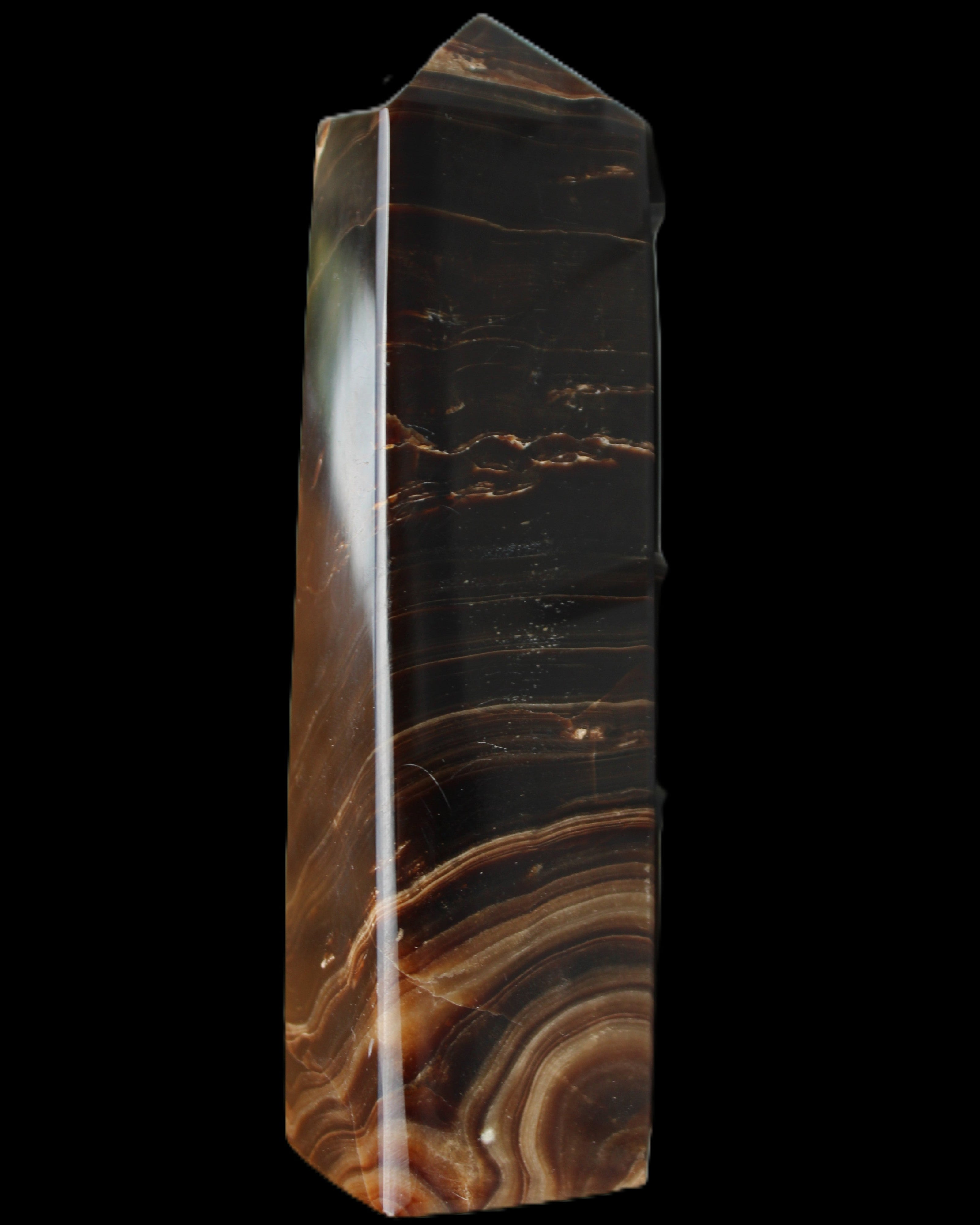 Chocolate Calcite obelisk 136*36mm 366g in sunlight - Rocks and Things Store