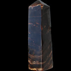 Chocolate Calcite obelisk 136*36mm 366g in sunlight - Rocks and Things Store