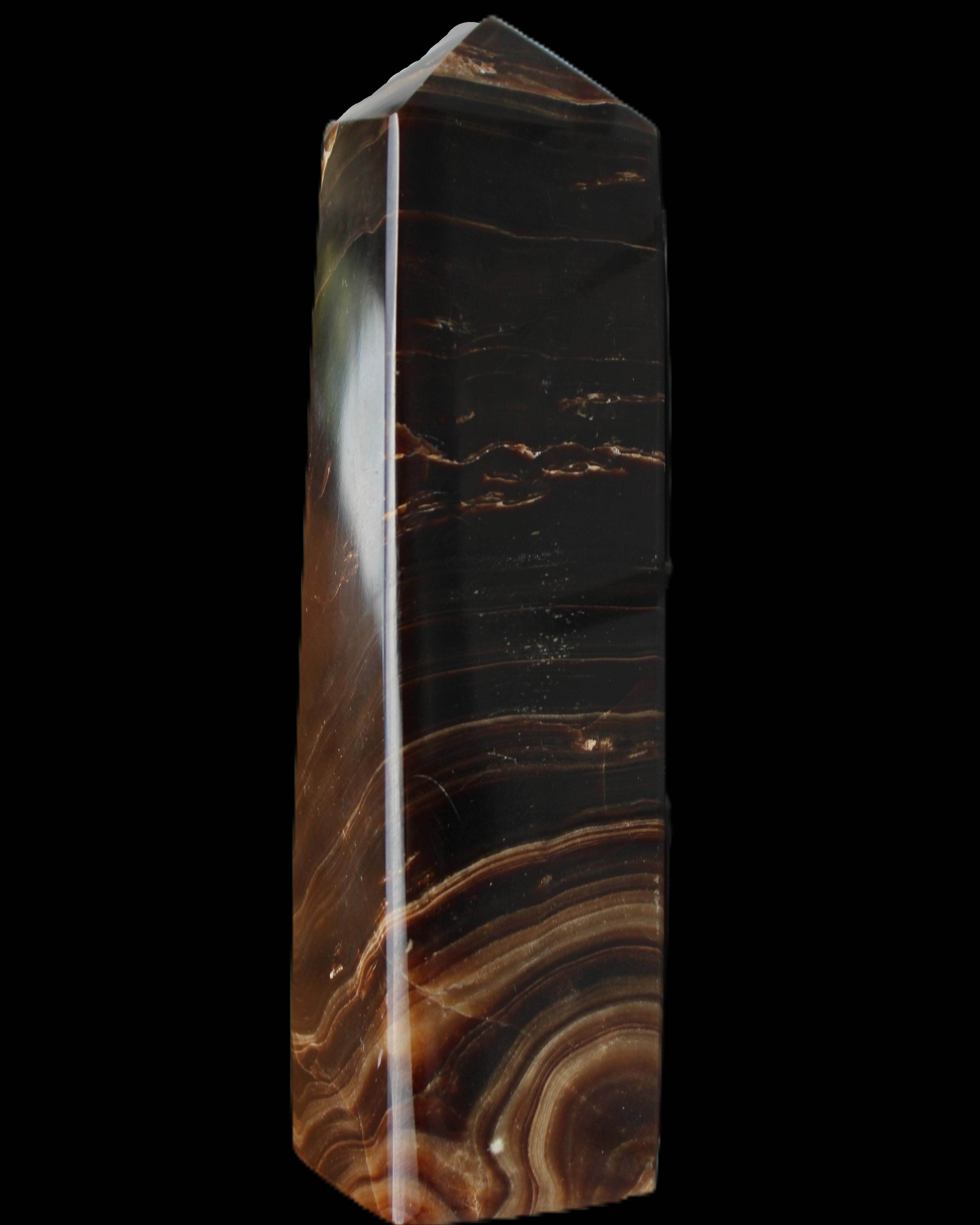 Chocolate Calcite obelisk 136*36mm 366g in sunlight - Rocks and Things Store