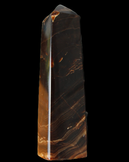 Chocolate Calcite obelisk 136*36mm 366g in sunlight - Rocks and Things Store