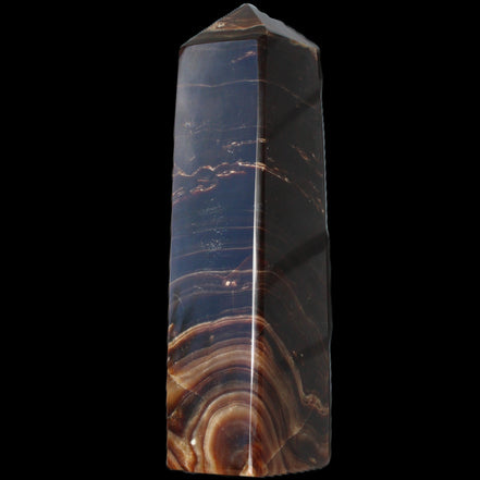 Chocolate Calcite obelisk 136*36mm 366g in sunlight - Rocks and Things Store