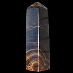Chocolate Calcite obelisk 136*36mm 366g in sunlight - Rocks and Things Store
