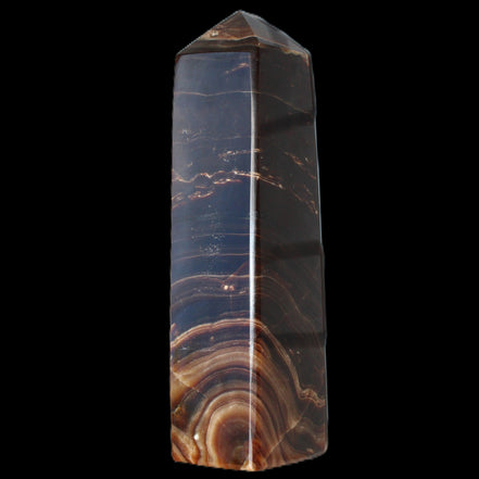 Chocolate Calcite obelisk 136*36mm 366g in sunlight - Rocks and Things Store