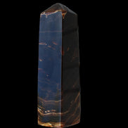 Chocolate Calcite obelisk 136*36mm 366g in sunlight - Rocks and Things Store