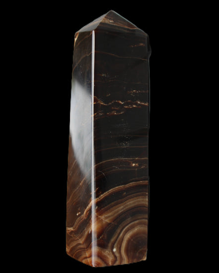 Chocolate Calcite obelisk 136*36mm 366g in sunlight - Rocks and Things Store