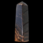 Chocolate Calcite obelisk 136*36mm 366g in sunlight - Rocks and Things Store