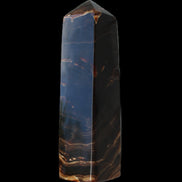 Chocolate Calcite obelisk 136*36mm 366g in sunlight - Rocks and Things Store