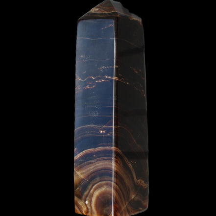 Chocolate Calcite obelisk 136*36mm 366g in sunlight - Rocks and Things Store