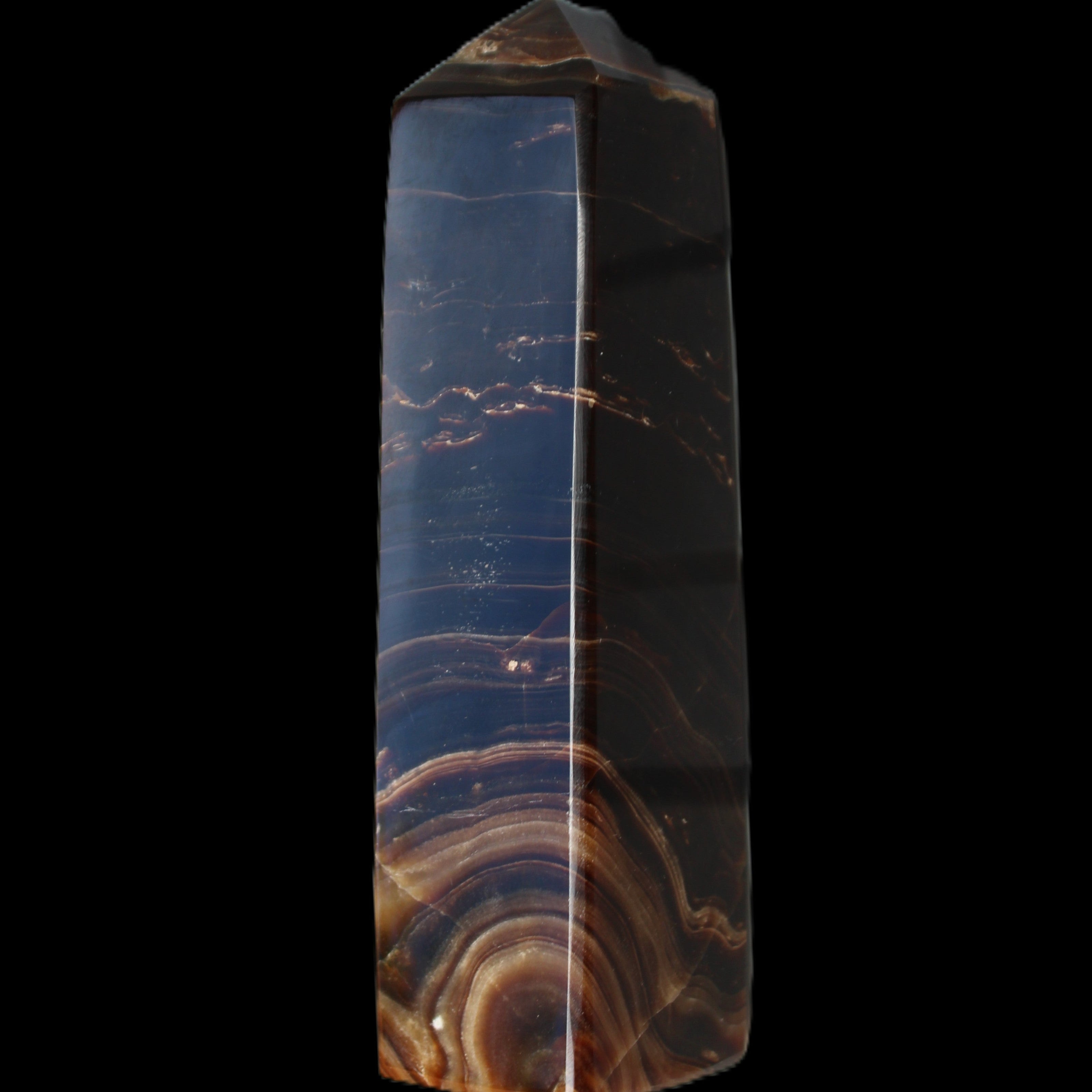 Chocolate Calcite obelisk 136*36mm 366g in sunlight - Rocks and Things Store