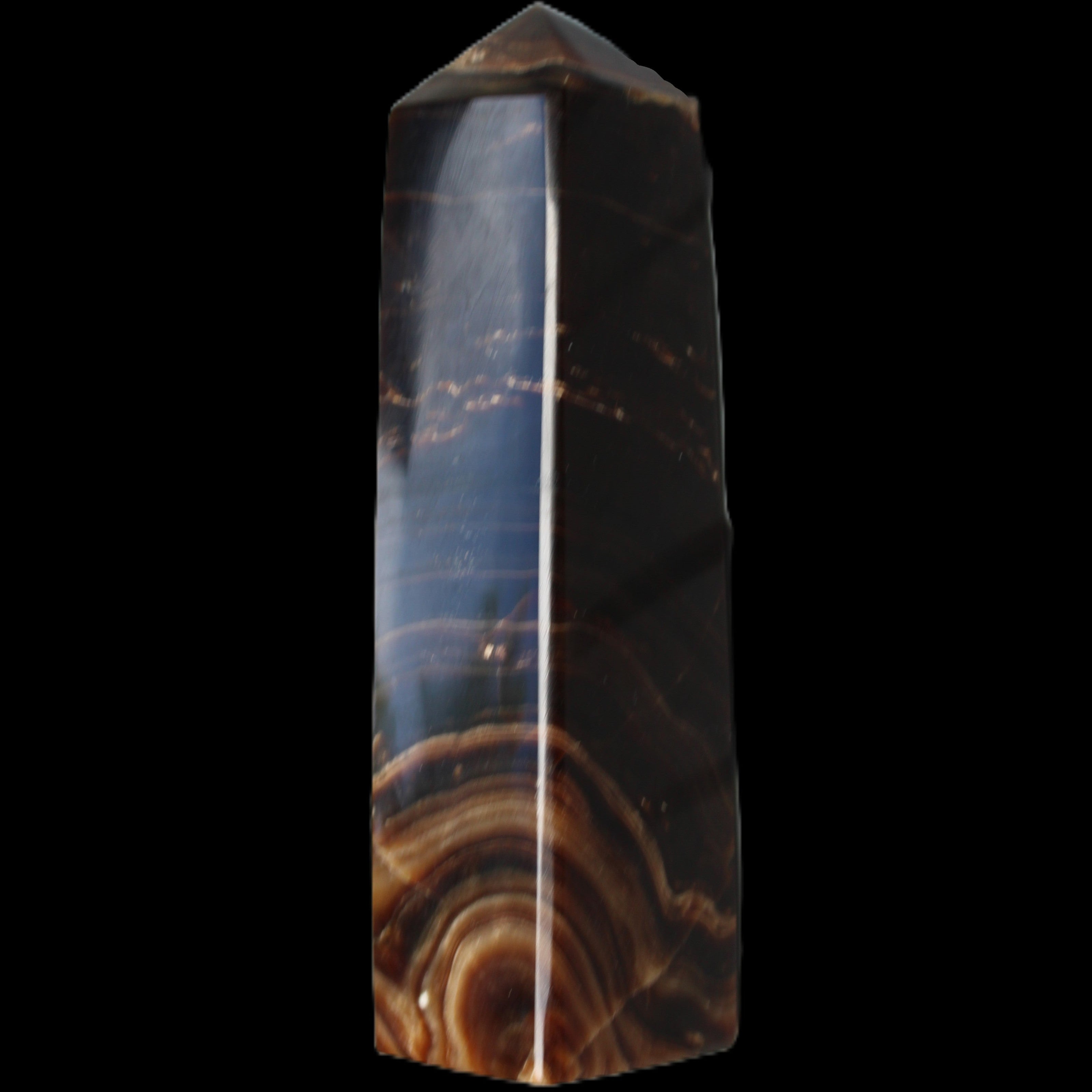 Chocolate Calcite obelisk 136*36mm 366g in sunlight - Rocks and Things Store