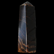 Chocolate Calcite obelisk 136*36mm 366g in sunlight - Rocks and Things Store