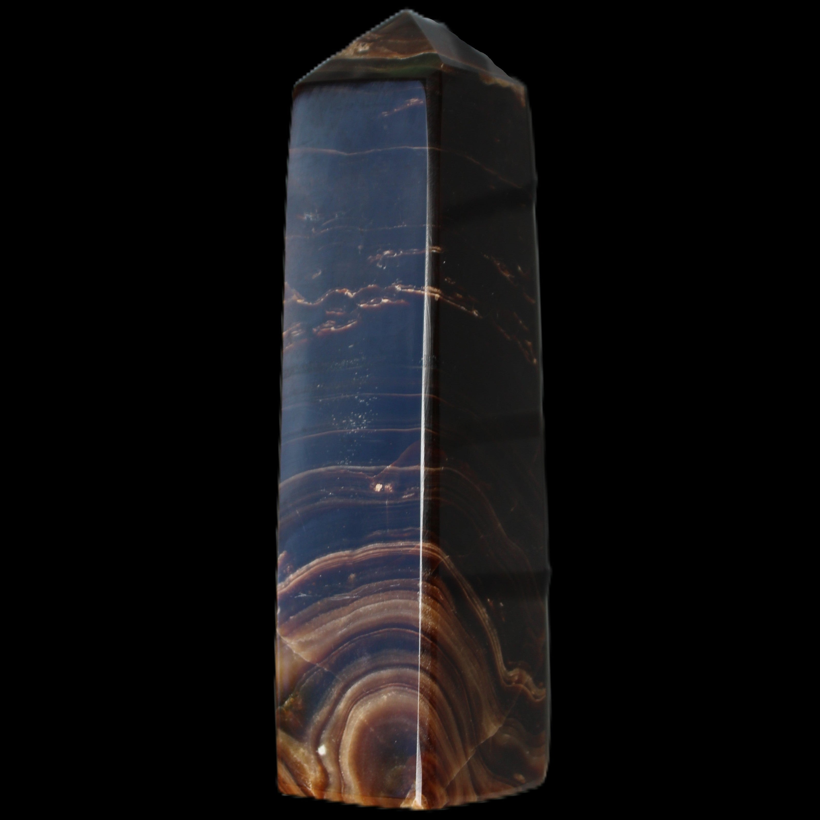 Chocolate Calcite obelisk 136*36mm 366g in sunlight - Rocks and Things Store