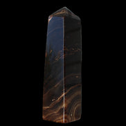 Chocolate Calcite obelisk 136*36mm 366g in sunlight - Rocks and Things Store