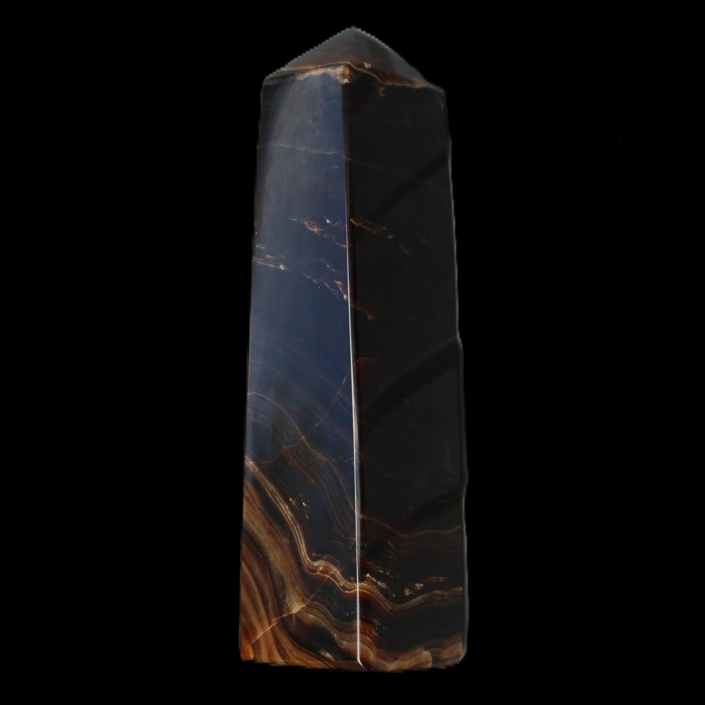 Chocolate Calcite obelisk 136*36mm 366g in sunlight - Rocks and Things Store