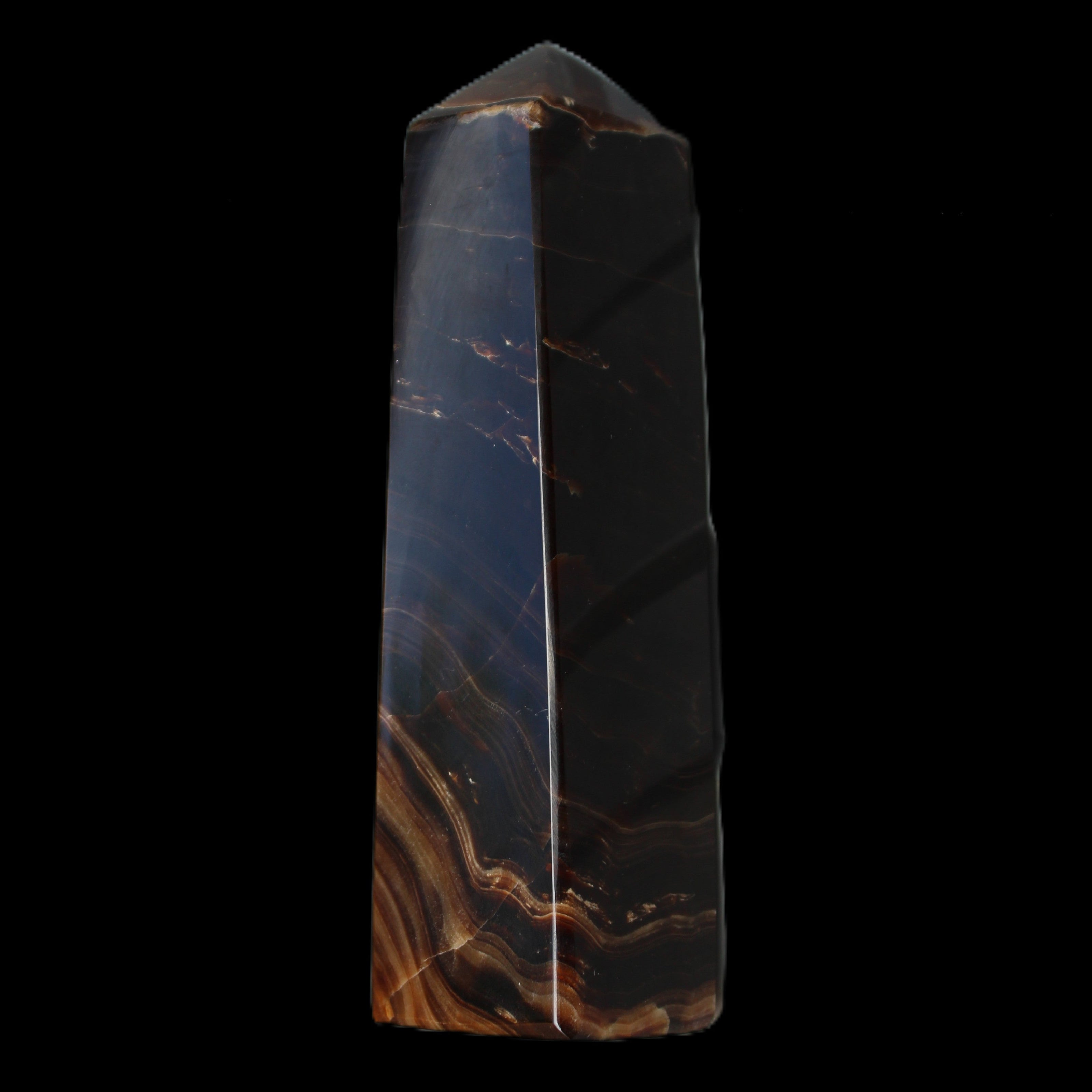 Chocolate Calcite obelisk 136*36mm 366g in sunlight - Rocks and Things Store