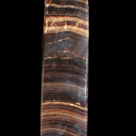 Chocolate Calcite obelisk 122*33mm 270g in sunlight - Rocks and Things Store