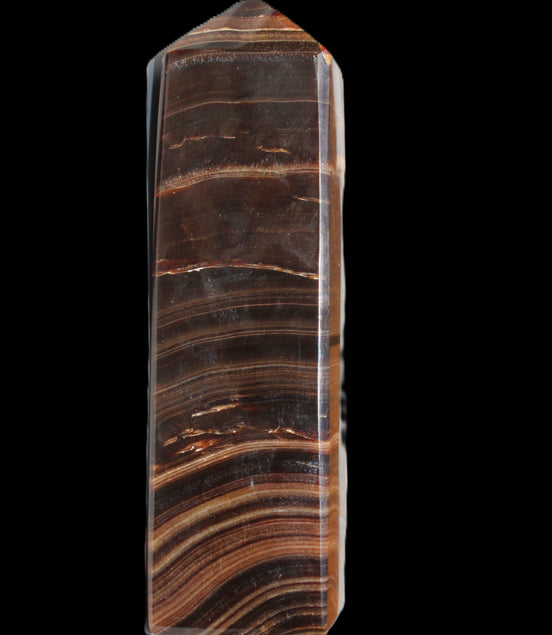 Chocolate Calcite obelisk 122*33mm 270g in sunlight - Rocks and Things Store