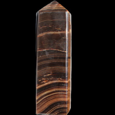 Chocolate Calcite obelisk 122*33mm 270g in sunlight - Rocks and Things Store