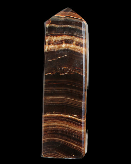 Chocolate Calcite obelisk 122*33mm 270g in sunlight - Rocks and Things Store